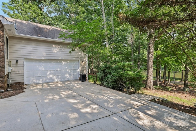 10311 Windtree Ln, Charlotte, NC 28215 - garage with concrete driveway