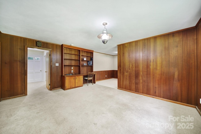 967 Hilldale Dr, Lancaster, SC 29720 - living area featuring wood walls, light colored carpet, and a desk
