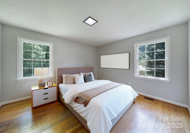 967 Hilldale Dr, Lancaster, SC 29720 - bedroom with baseboards and wood finished floors