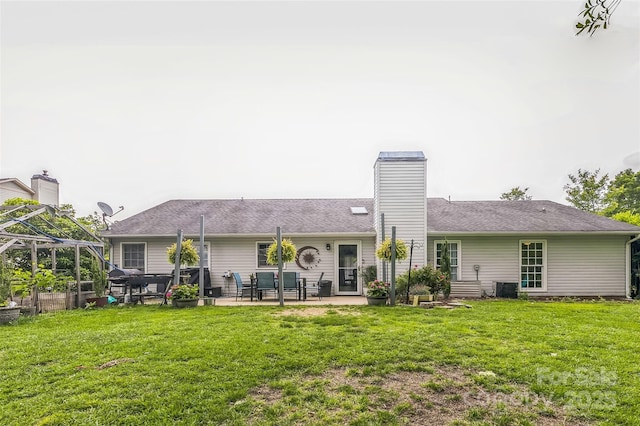 60 Southchase Dr, Fletcher, NC 28732 - rear view of property with a patio area, a chimney, and a lawn
