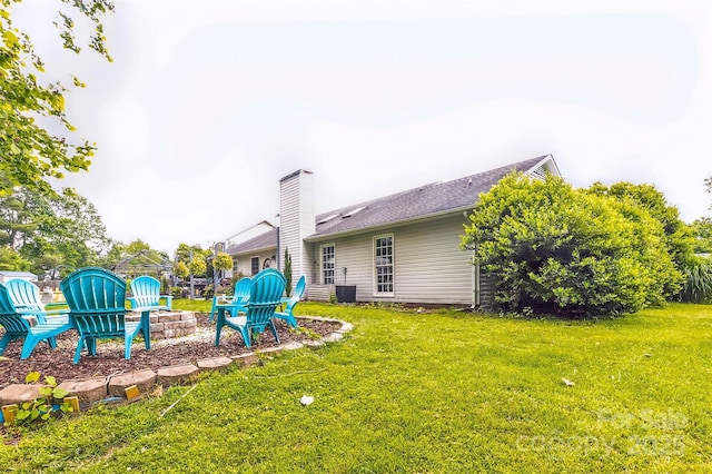 60 Southchase Dr, Fletcher, NC 28732 - view of grassy yard featuring a fire pit