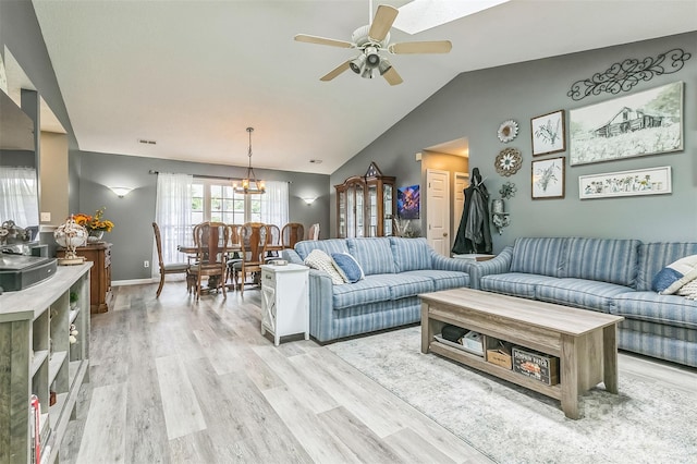 60 Southchase Dr, Fletcher, NC 28732 - living area with light wood-style floors, a ceiling fan, lofted ceiling, a chandelier, and baseboards