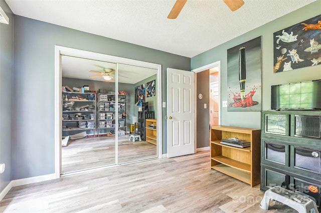60 Southchase Dr, Fletcher, NC 28732 - home office featuring a ceiling fan, wood finished floors, baseboards, and a textured ceiling