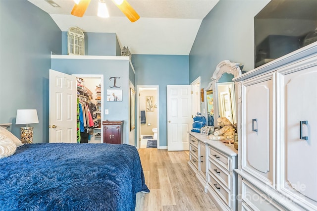 60 Southchase Dr, Fletcher, NC 28732 - bedroom featuring a walk in closet, light wood finished floors, ensuite bathroom, and a closet