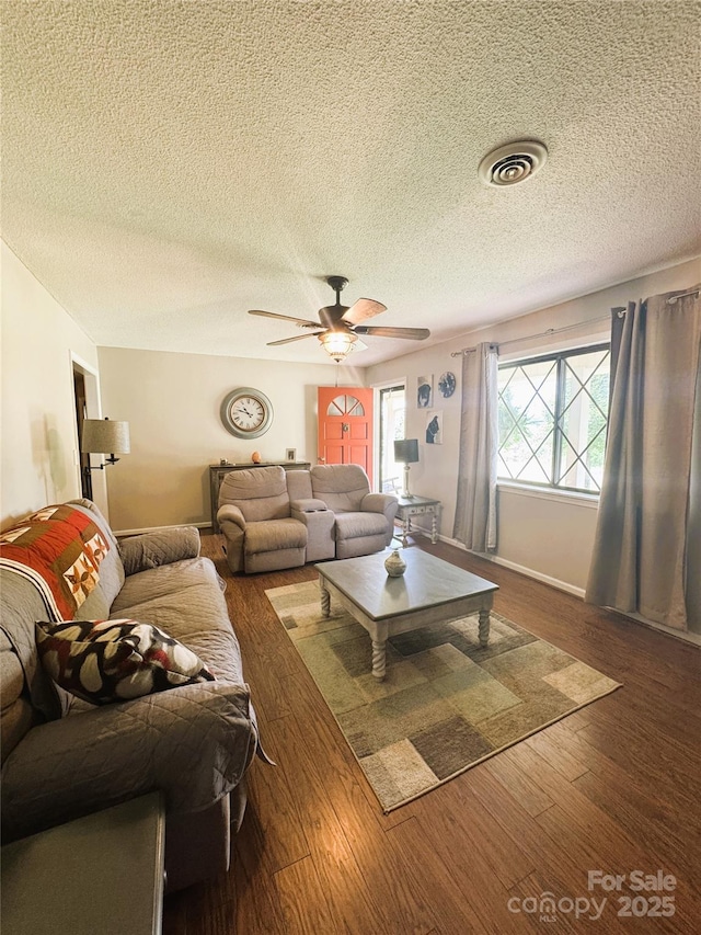 136 Christopher Rd, Marion, NC 28752 - living room featuring wood finished floors, a textured ceiling, and ceiling fan