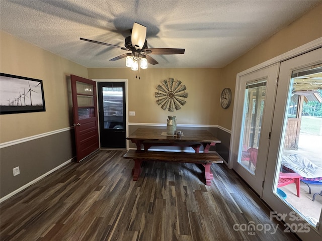136 Christopher Rd, Marion, NC 28752 - dining area with wood finished floors, ceiling fan, and a textured ceiling