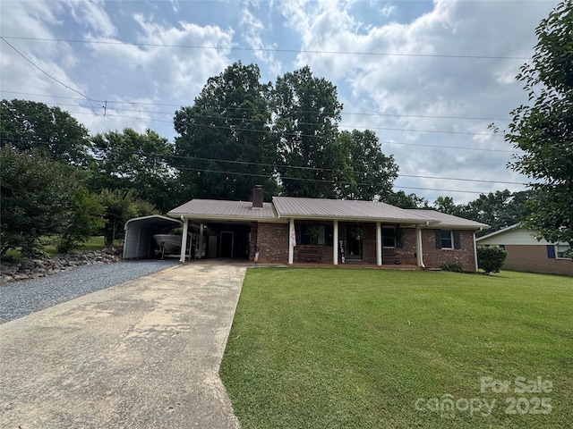 136 Christopher Rd, Marion, NC 28752 - ranch-style house with driveway, a porch, a carport, a front yard, and a chimney