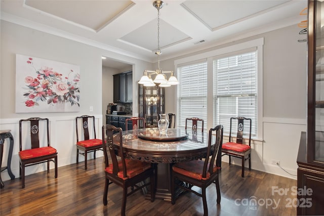 10012 Michael Crossing Dr, Charlotte, NC 28213 - dining space featuring coffered ceiling, dark wood-type flooring, a chandelier, and crown molding