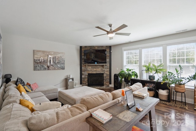 10012 Michael Crossing Dr, Charlotte, NC 28213 - living room with ceiling fan, wood finished floors, a fireplace, and baseboards