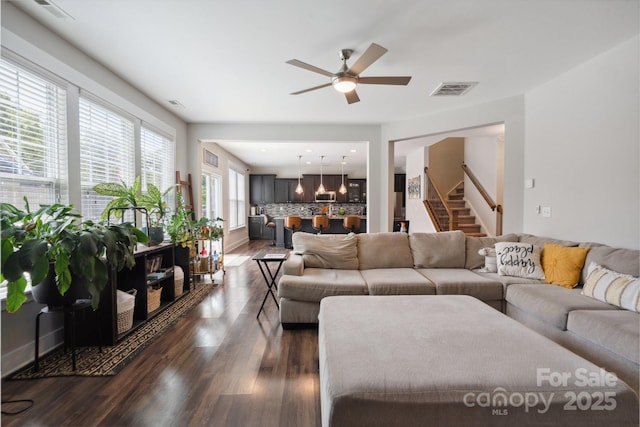 10012 Michael Crossing Dr, Charlotte, NC 28213 - living area featuring ceiling fan, dark wood-style floors, stairway, and recessed lighting