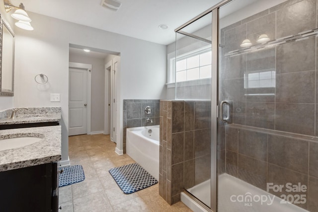 10012 Michael Crossing Dr, Charlotte, NC 28213 - bathroom with double vanity, tile patterned floors, a stall shower, a bath, and baseboards