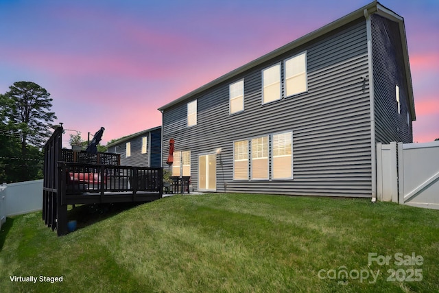 10012 Michael Crossing Dr, Charlotte, NC 28213 - back of house at dusk with a wooden deck