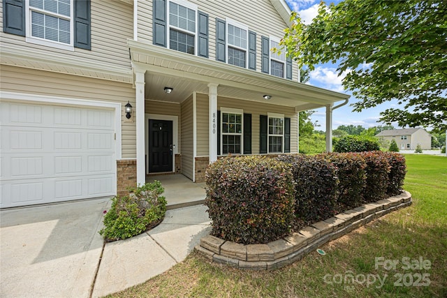 8400 Empress Ct, Charlotte, NC 28227 - view of exterior entry featuring a porch