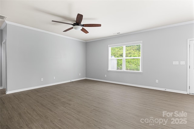 8400 Empress Ct, Charlotte, NC 28227 - empty room with ornamental molding, ceiling fan, dark wood finished floors, and baseboards