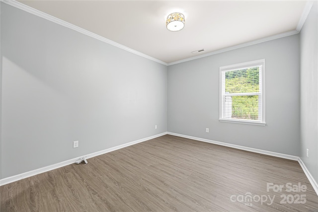 8400 Empress Ct, Charlotte, NC 28227 - unfurnished room featuring wood finished floors, ornamental molding, and baseboards