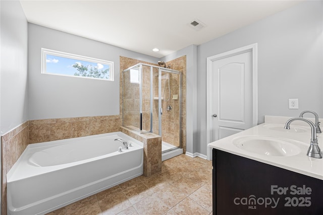 8400 Empress Ct, Charlotte, NC 28227 - full bathroom featuring a garden tub, a shower stall, double vanity, and tile patterned flooring