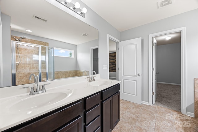 8400 Empress Ct, Charlotte, NC 28227 - full bath featuring double vanity, a shower stall, tile patterned floors, and baseboards