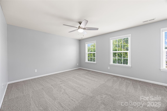 8400 Empress Ct, Charlotte, NC 28227 - carpeted spare room featuring baseboards and ceiling fan