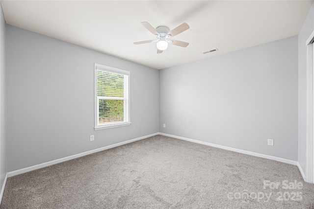 8400 Empress Ct, Charlotte, NC 28227 - carpeted spare room featuring baseboards and ceiling fan