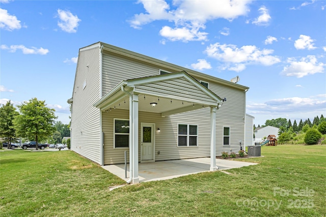 8400 Empress Ct, Charlotte, NC 28227 - rear view of house featuring central AC unit, a patio, a yard, and a playground