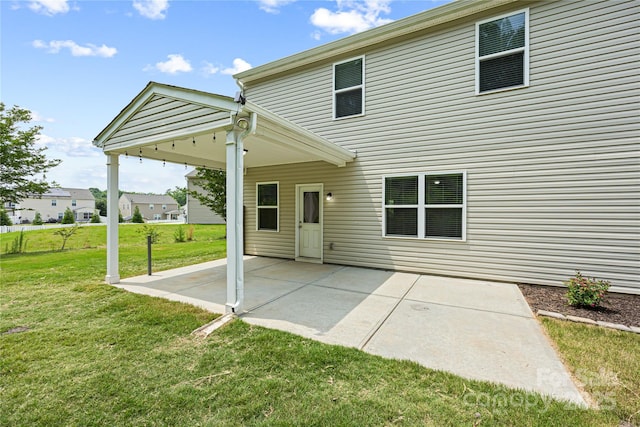 8400 Empress Ct, Charlotte, NC 28227 - back of property with a lawn and a patio area