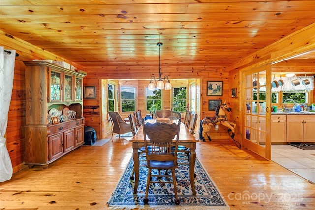 252 Idylwild Ln, Black Mountain, NC 28711 - dining area with wood walls, light wood finished floors, and wood ceiling