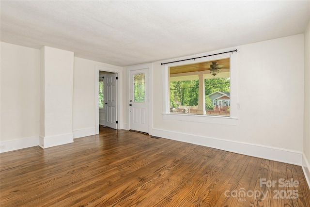 540 Fairview Rd, Asheville, NC 28803 - unfurnished room featuring baseboards, wood finished floors, and healthy amount of natural light