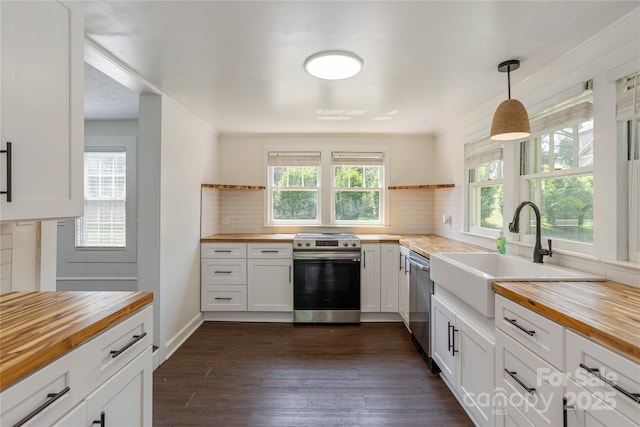 540 Fairview Rd, Asheville, NC 28803 - kitchen with butcher block countertops, appliances with stainless steel finishes, open shelves, and a sink