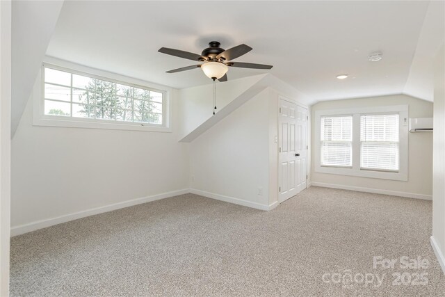 540 Fairview Rd, Asheville, NC 28803 - bonus room with carpet floors, a ceiling fan, lofted ceiling, a wall mounted AC, and baseboards
