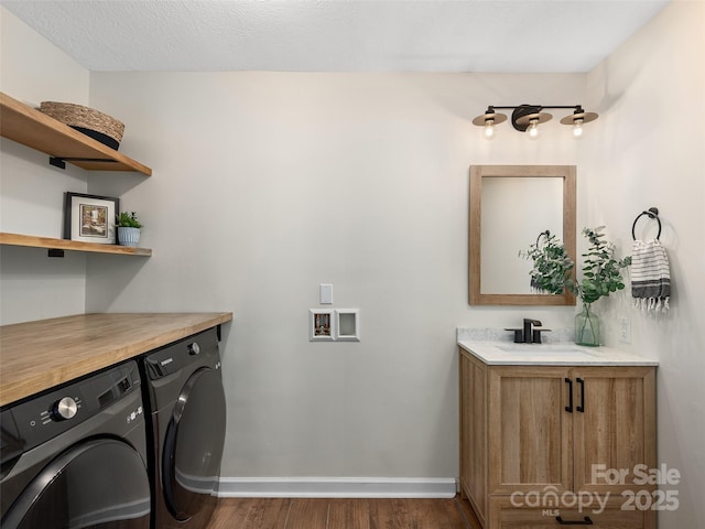 31 Rory Phillips Vw, Candler, NC 28715 - laundry room featuring independent washer and dryer, dark wood-style flooring, and baseboards