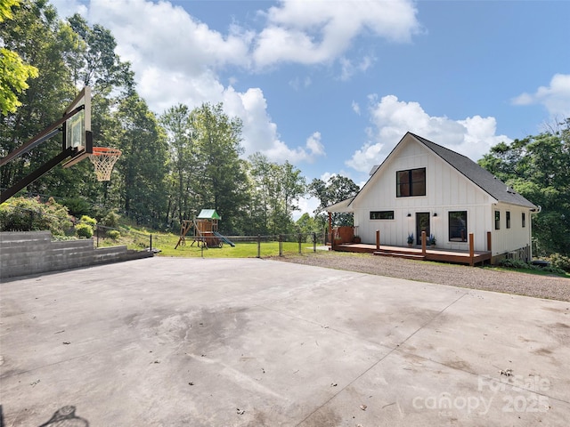 31 Rory Phillips Vw, Candler, NC 28715 - view of side of property featuring a playground, board and batten siding, and a deck