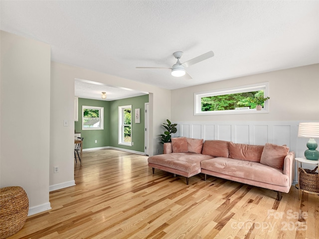31 Rory Phillips Vw, Candler, NC 28715 - living area featuring healthy amount of natural light, light wood-type flooring, and a ceiling fan