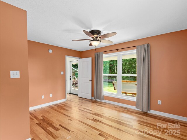 31 Rory Phillips Vw, Candler, NC 28715 - spare room featuring ceiling fan, baseboards, and light wood-style floors