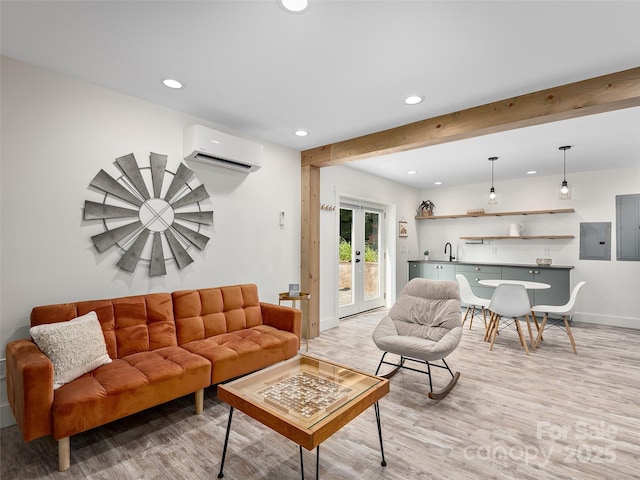31 Rory Phillips Vw, Candler, NC 28715 - living room with an AC wall unit, recessed lighting, light wood finished floors, wet bar, and electric panel