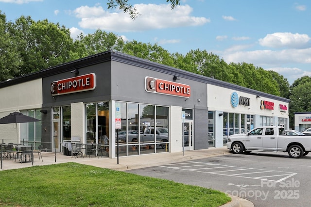 5002 Abode Lily Ln, Charlotte, NC 28227 - view of commercial property featuring uncovered parking