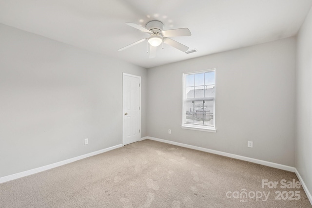 5002 Abode Lily Ln, Charlotte, NC 28227 - carpeted spare room featuring ceiling fan and baseboards