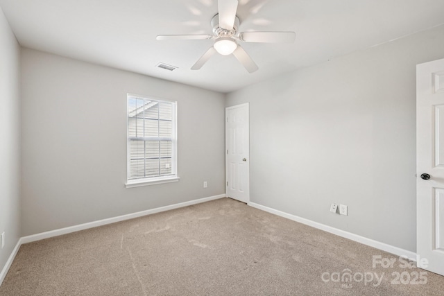 5002 Abode Lily Ln, Charlotte, NC 28227 - spare room featuring carpet flooring and ceiling fan