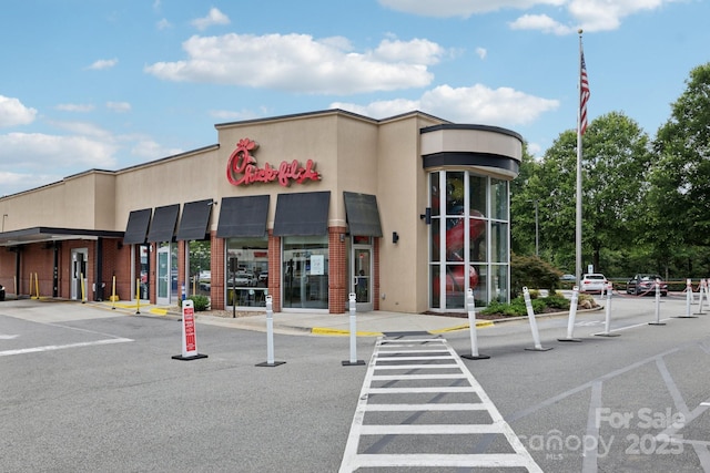 5002 Abode Lily Ln, Charlotte, NC 28227 - view of commercial property featuring uncovered parking