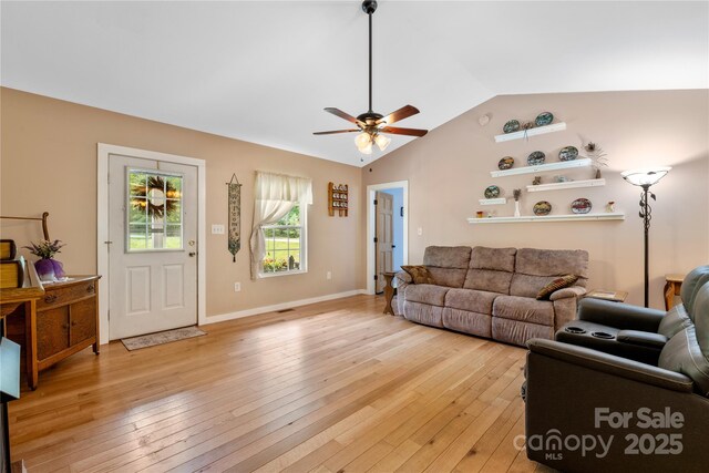 251 Vera Ln, Columbus, NC 28722 - living area with lofted ceiling, light wood-style flooring, ceiling fan, and baseboards