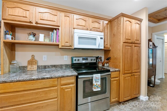 251 Vera Ln, Columbus, NC 28722 - kitchen featuring electric stove, white microwave, and open shelves
