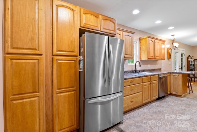 251 Vera Ln, Columbus, NC 28722 - kitchen featuring appliances with stainless steel finishes, a sink, dark countertops, recessed lighting, and a chandelier