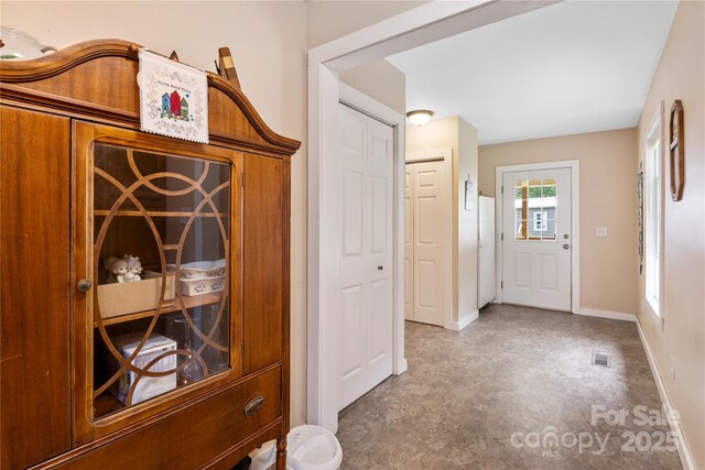 251 Vera Ln, Columbus, NC 28722 - foyer entrance with tile patterned floors and baseboards