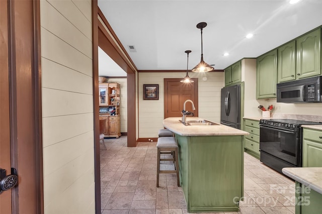55 Toxaway Shrs Unit 14, Lake Toxaway, NC 28747 - kitchen featuring green cabinets, black appliances, a kitchen bar, recessed lighting, and hanging light fixtures