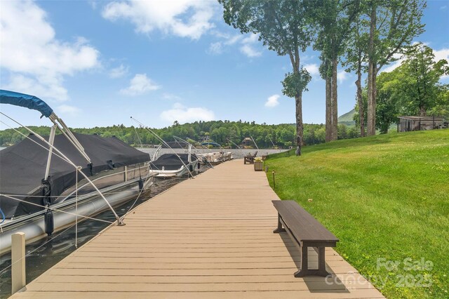 55 Toxaway Shrs Unit 14, Lake Toxaway, NC 28747 - dock with a lawn