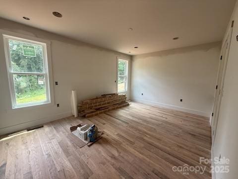 808 Country Club Dr, Waynesville, NC 28786 - empty room with wood finished floors