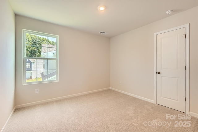 2118 Columbidae Ln, Gastonia, NC 28052 - empty room featuring a smoke detector and light carpet