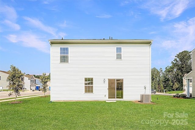 2118 Columbidae Ln, Gastonia, NC 28052 - rear view of house featuring a lawn
