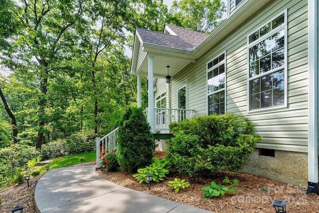 387 Goodview Dr, Hendersonville, NC 28792 - view of side of property with roof with shingles and covered porch