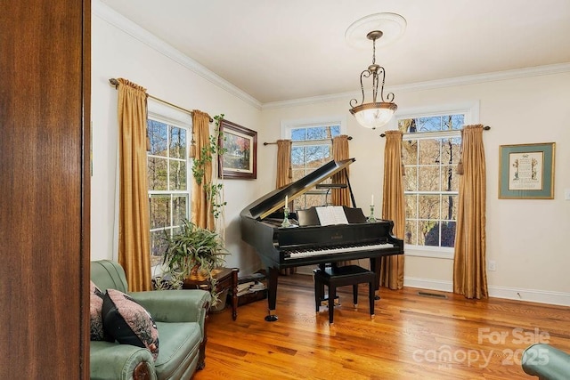 387 Goodview Dr, Hendersonville, NC 28792 - sitting room with wood finished floors and ornamental molding