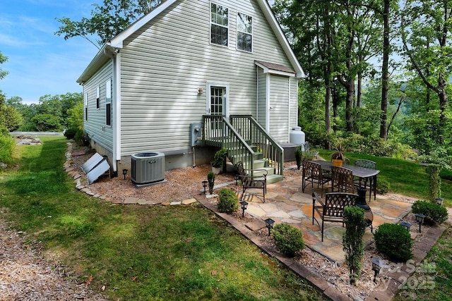 387 Goodview Dr, Hendersonville, NC 28792 - back of property with a patio and a yard
